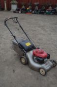 A HONDA ISY PETROL SELF PROPELLED LAWNMOWER with grassbox