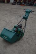 A QUALCAST PETROL 17 INCH CYLINDER LAWNMOWER with grassbox (losses)
