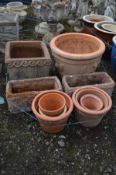 A QUANTITY OF VARIOUS TERRACOTTA GARDEN PLANTERS, to include a circular and a square plant pot, a