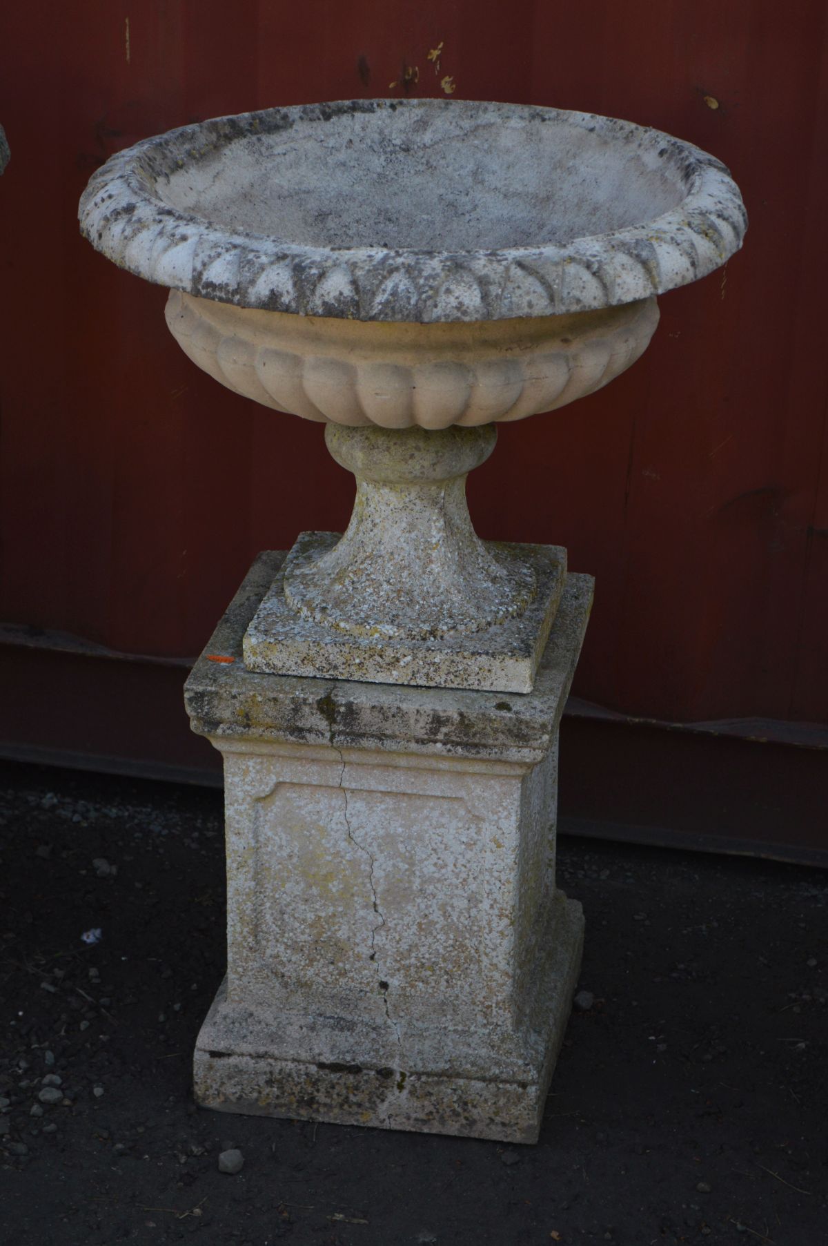 A PAIR OF WEATHERED RECONSTITUTED STONE CAMPANA GARDEN URNS on a separate square plinth base, - Image 2 of 2