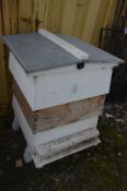 A WBC BEE HIVE with gabled roof, painted in the colour white, width 61cm x depth 62cm x