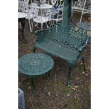 A GREEN PAINTED ALUMINIUM GARDEN BENCH with arched lattice work back to armrests, width 95cm and a