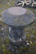 A SANDSTONE STADDLE STONE on circular bases, diameter 60cm x height 71cm (possibly a pair to lot