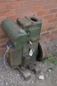 A VINTAGE THE LISTER IRRIGATION PUMP, with an internal combustion engine, painted green,