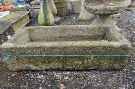 A RECTANGULAR SANDSTONE TROUGH, length 95cm x depth 46cm height 26cm