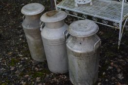 THREE ALUMINIUM MILK CHURNS