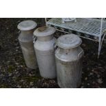 THREE ALUMINIUM MILK CHURNS