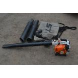 A STIHL SH 75 PETROL BLOWER (pulls freely and runs) along with two Stihl garden vac bags, a