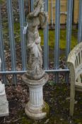 A 20TH CENTURY COMPOSITE GARDEN STATUE of a semi clad classical figure of a lady in robes to the