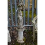 A 20TH CENTURY COMPOSITE GARDEN STATUE of a semi clad classical figure of a lady in robes to the