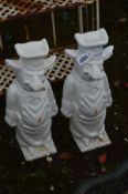 A PAIR OF WHITE PAINTED CAST IRON STANDING PIGS, dressed as a chef, height 60cm