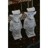 A PAIR OF WHITE PAINTED CAST IRON STANDING PIGS, dressed as a chef, height 60cm