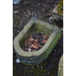 A SANDSTONE WATER TROUGH, width 42cm x depth 54cm x height 25cm