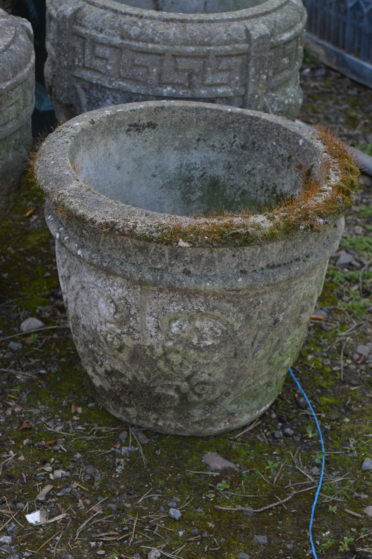 A PAIR OF WEATHERED COMPOSITE GREEK CIRCULAR PLANTERS, diameter 37cm x height 38cm and another - Image 3 of 3