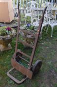 A VINTAGE CAST IRON SACK TRUCK