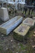 A SMALL SANDSTONE TROUGH, length 39cm along with two composite rectangular troughs (3)