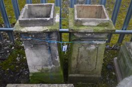 A PAIR OF VICTORIAN CLAY CHIMNEY POTS, 34cm squared x height 76cm (Sd)