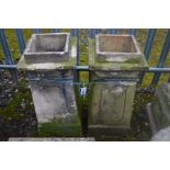A PAIR OF VICTORIAN CLAY CHIMNEY POTS, 34cm squared x height 76cm (Sd)