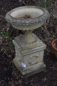 A LARGE COMPOSITE CAMPAGNA GARDEN URN, on a separate square plinth diameter 66cm x overall height