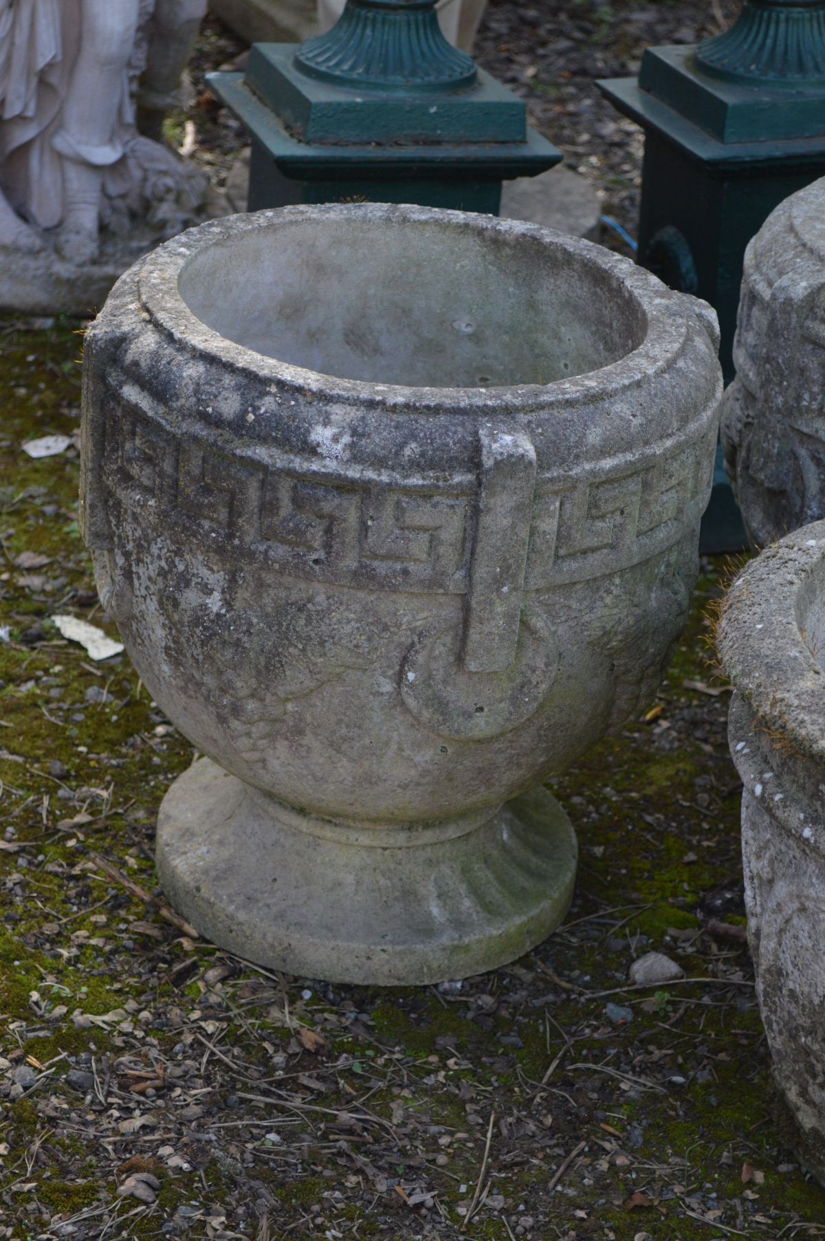 A PAIR OF WEATHERED COMPOSITE GREEK CIRCULAR PLANTERS, diameter 37cm x height 38cm and another - Image 2 of 3