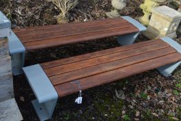 A PAIR OF STEEL ENDED FLAT PARK BENCHES with teak slates, length 201cm x depth 47cm x height 43cm