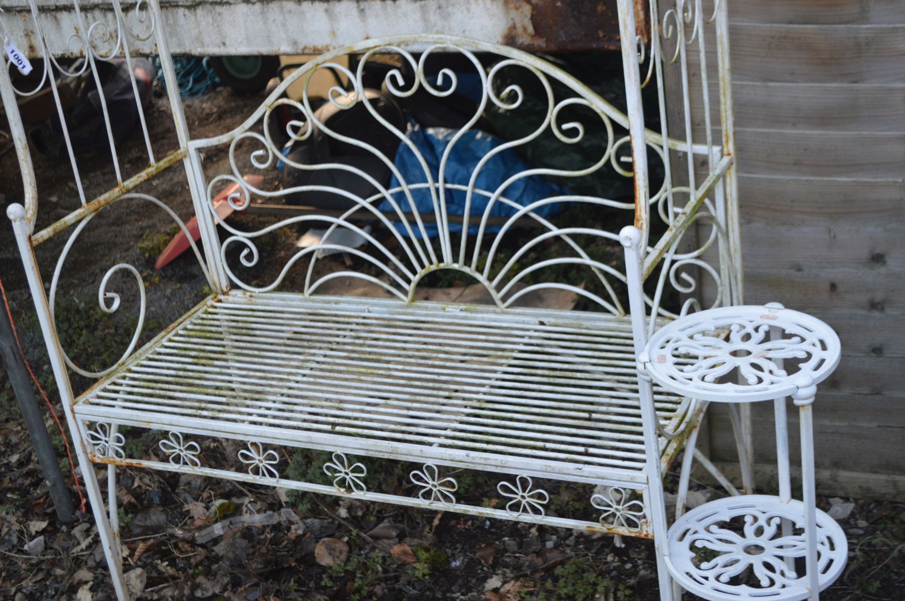 A WHITE PAINTED WROUGHT IRON GARDEN BENCH with an arched overhanging top, width 110cm x depth 51cm x - Image 2 of 3