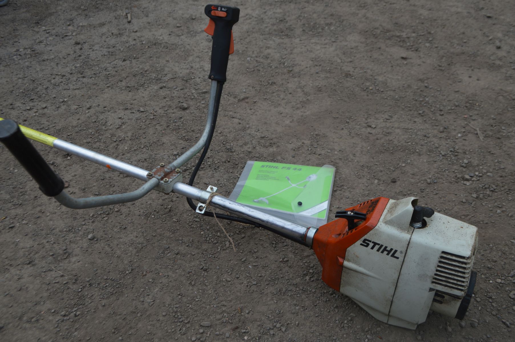 A STIHL FS 44 PERTOL STRIMMER, with manual (pulls freely and starts) - Image 2 of 3