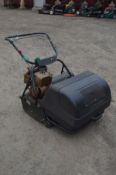 A WEBB PETROL 24 INCH CYLINDER LAWNMOWER. with grassbox and detachable rear seated roller