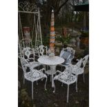 A HEAVY ALUMINIUM CIRCULAR GARDEN TABLE, painted in white, diameter 72cm x height 69cm, parasol, and