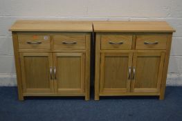 A PAIR OF LIGHT OAK SIDE CABINETS, with two drawers, width 80cm x depth 35cm x height 81cm