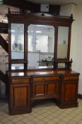 A LARGE LATE VICTORIAN WALNUT AND EBONISED BANDED MIRRORBACK SIDEBOARD, triple mirrored top and