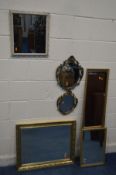 A PAIR OF ORNATE BRASS GRADUATED MIRRORS, along with a gilt on wood bevelled edge wall mirror and