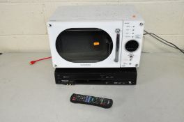 A PANASONIC DMR-EZ49V DVD VIDEO PLAYER with remote and a Daewoo Microwave (both PAT pass and working