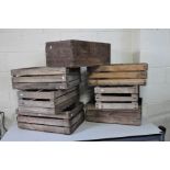 SEVEN VINTAGE WOODEN CRATES comprising of one Russian Salmon box 58cm wide 38cm deep and 24cm high