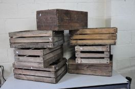 SEVEN VINTAGE WOODEN CRATES comprising of one Russian Salmon box 58cm wide 38cm deep and 24cm high