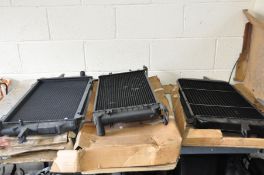 THREE AFTERMARKET VINTAGE FORD RADIATORS comprising of a Mk1 to 1985 new in box ,a Mk1 Sierra new in