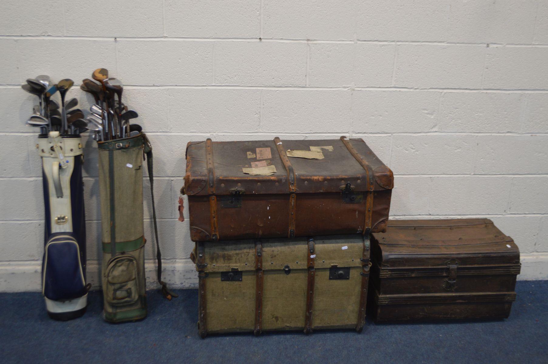 THREE VINTAGE TRUNKS, to include a fabric and wooden trunk, tin trunk, etc (Sd) along with two