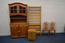 A MODERN PINE DRESSER with two drawers, width 97cm x depth 43cm x height 199cm, along with a pine