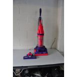 A DYSON DC07 VACUUM CLEANER with matching floor attachment (PAT pass and working)