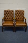 A PAIR OF TAN BUTTONED LEATHER AND MAHOGANY FRAMED OPEN ARMCHAIRS, width 60cm x depth 65cm x