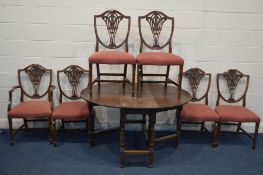 A SET OF SIX MAHOGANY PRINCE OF WALES BACK DINING CHAIRS, including one carver, together with an oak