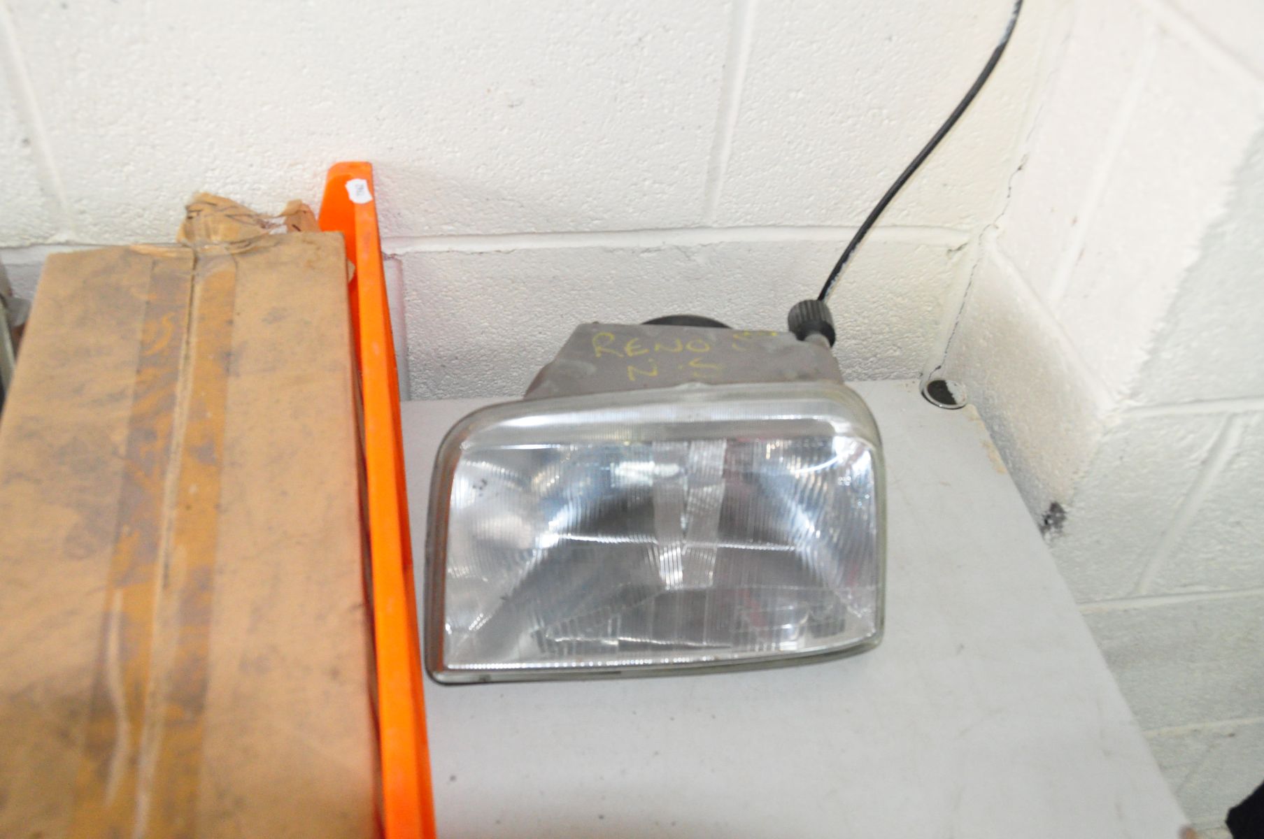 A TRAY CONTAINING VINTAGE CAR HEAD AND TAIL LIGHTS including a brand new old stock SAP Ford Sierra - Image 5 of 5