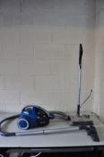 A HOOVER VORTEX PULL ALONG VACUUM CLEANER and a GTech Cordless vacuum cleaner (both PAT pass and