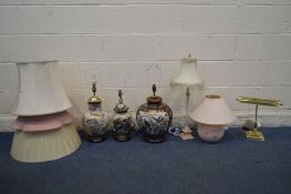 THREE ORIENTAL CERAMIC TABLE LAMPS, with fabric shades, along with a brass bankers lamp and two