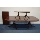 A GOOD QUALITY MAHOGANY TWIN PEDESTAL DINING TABLE with two additional leaves, extended length 267cm