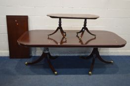 A GOOD QUALITY MAHOGANY TWIN PEDESTAL DINING TABLE with two additional leaves, extended length 267cm