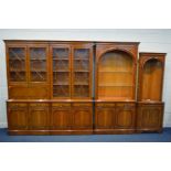 A THREE SECTION YEWWOOD BOOKCASE, to include two glazed bookcases, width 199cm x depth 42cm x height