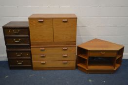 A TEAK DOUBLE DOOR CABINET, AND MATCHING CHEST OF THREE DRAWERS, along with a corner unit and a pair