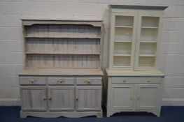 A PINE DRESSER with three drawers, width 141cm x depth 44cm x height 167cm and a Edwardian double