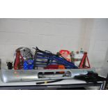 A COLLECTION OF AUTOMOTIVE PARTS AND TOOLS including axle stands, ramps, a Japanese taillight, a